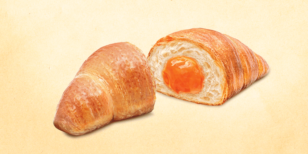 Close-up animation of golden croissants revealing a gooey filling – delicious and tempting