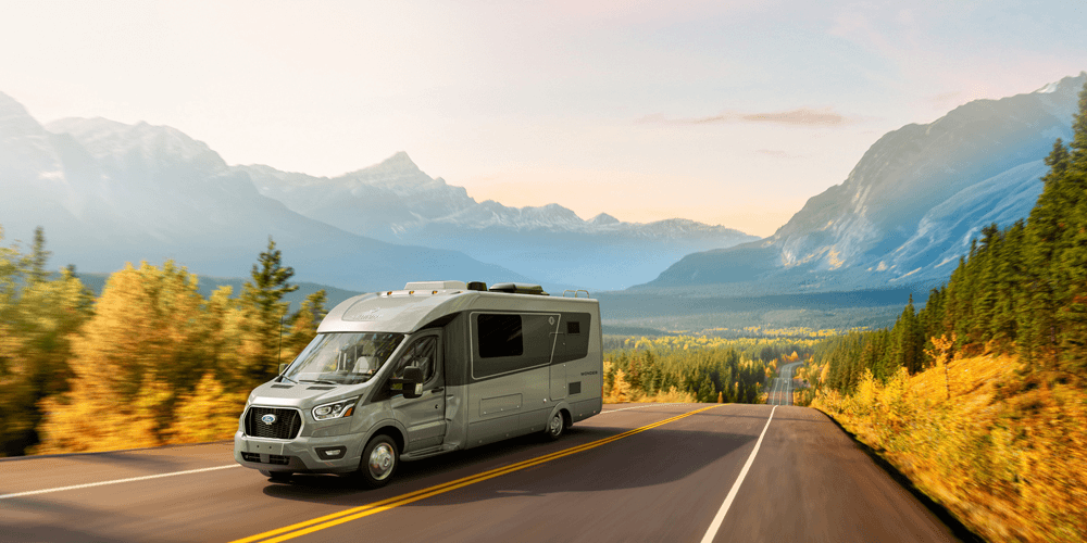 Looping scene of a campervan parked by a scenic mountain road – peaceful travel and adventure aesthetic