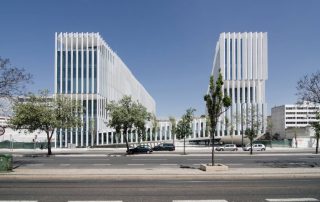 Modern architectural office buildings with glass facades – urban corporate district in Lisbon, Portugal