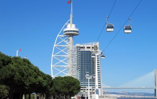 Modern cable car ride and Vasco da Gama Tower – Expo Park skyline in Lisbon, Portugal