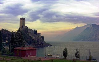 Peaceful hilltop village with mountains in the distance – classic Italian countryside scene