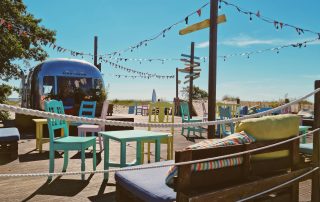 Colorful wooden pier and restaurant in seaside Estonian town