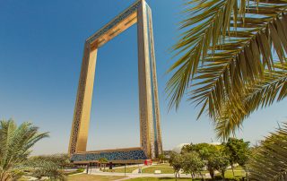 Golden Dubai Frame landmark under clear sky – iconic city symbol