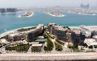 High-rise hotels and coastline view from above Dubai Marina