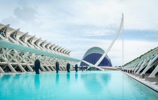 Modern white bridges and reflecting pool at Valencia’s City of Arts and Sciences – futuristic Spanish architecture