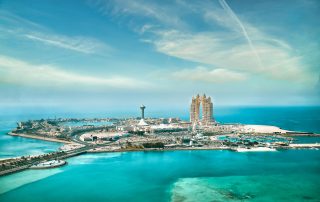 Turquoise waterfront skyline of Dubai – aerial beach view for shoots