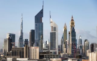 Modern skyscrapers in Dubai skyline under clear sky – filming hub
