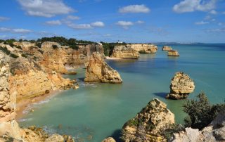Dramatic coastal cliffs and turquoise waters of Algarve, Portugal – scenic beach landscape
