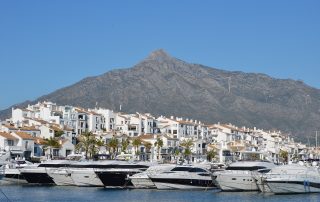 Luxury yachts docked at Puerto Banús marina, Marbella – upscale coastal destination